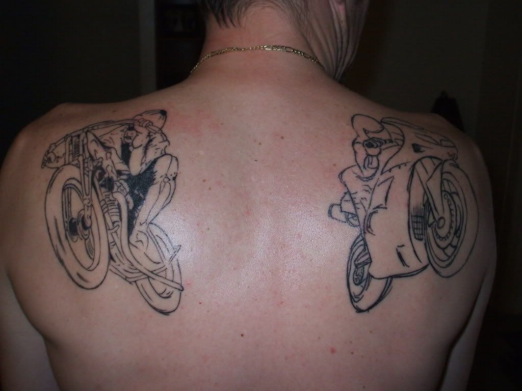 male upper back quote tattoos: