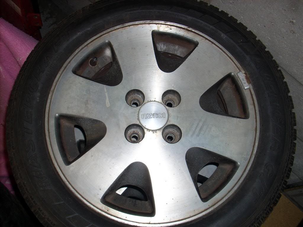 http://i218.photobucket.com/albums/cc202/poisonousbeef/For%20Sale/IsuzuWheel.jpg